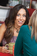 Shocked Woman with Smile in Cafe