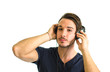 Photo: Handsome young man listening to music on headphones Handsome young man listening to music on headphones