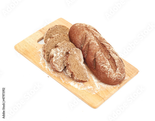 Photo: Fresh bread with ear of wheat Fresh bread with ear of wheat