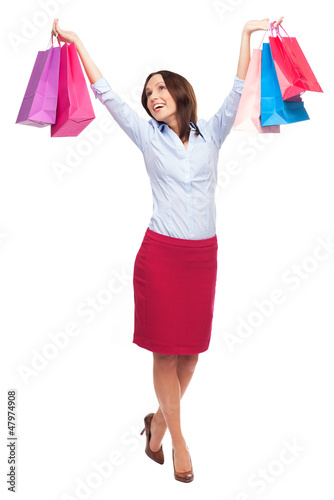 Photo: Happy woman with shopping bags Happy woman with shopping bags