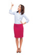 Attractive businesswoman pointing up