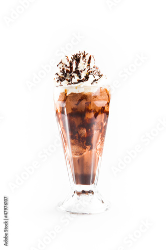 Photo: Iced coffee with whipped cream isolated on white background Iced coffee with whipped cream isolated on white background
