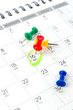 Calendar with pushpins
