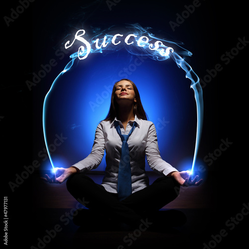 Photo: young businesswoman and success word young businesswoman and success word
