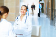 Portrait of two friendly female doctors