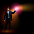 Businessman with light shining