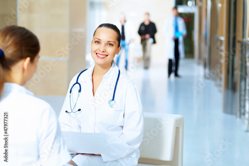 Photo: Portrait of two friendly female doctors Portrait of two friendly female doctors