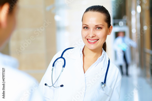 Photo: Portrait of two friendly female doctors Portrait of two friendly female doctors