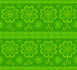 Patrick's day green knitted clovers vector seamless pattern