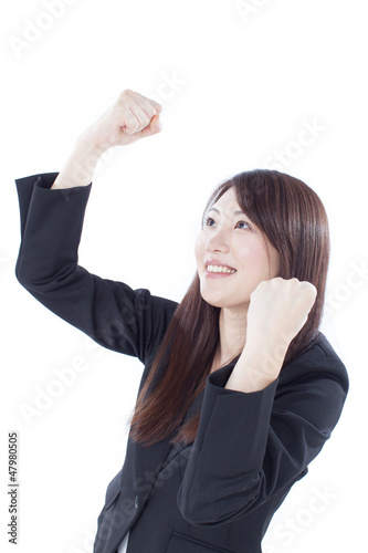 Photo: ガッツポーズする女性 ガッツポーズする女性