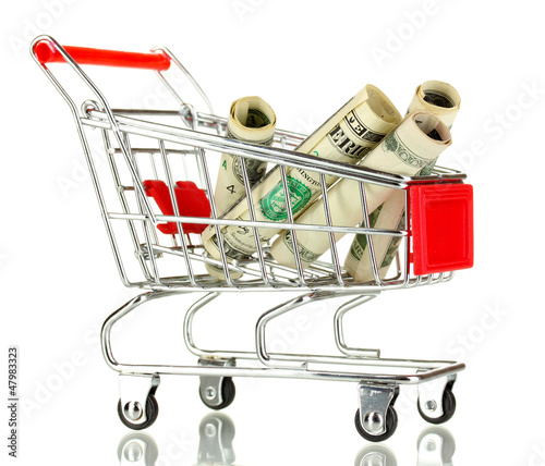 Photo: Money in cart isolated on white Money in cart isolated on white