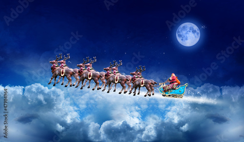 Photo: Père Noël dans le ciel Père Noël dans le ciel