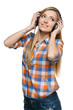 Photo: Young female enjoying music in headphones Young female enjoying music in headphones