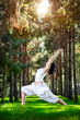 Yoga warrior pose in the park
