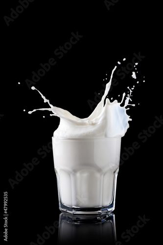 Photo: Splash in a glass with milk Splash in a glass with milk
