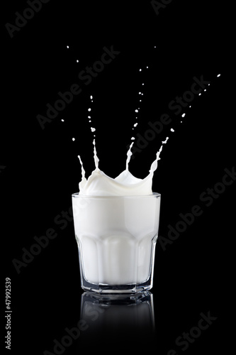 Photo: Splash in a glass with milk Splash in a glass with milk