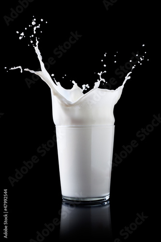Photo: Splash in a glass with milk Splash in a glass with milk