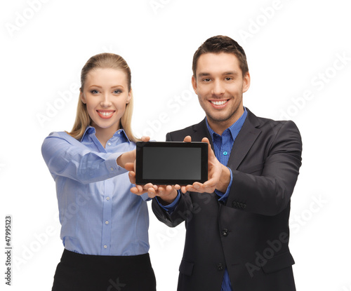 Photo: man and woman with tablet pc man and woman with tablet pc
