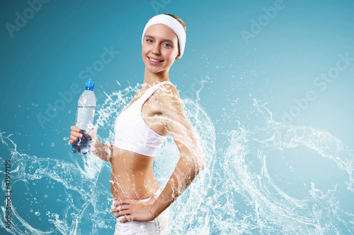 Photo: Sport woman and pure water Sport woman and pure water