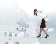 Businesswoman with a puzzle pieces