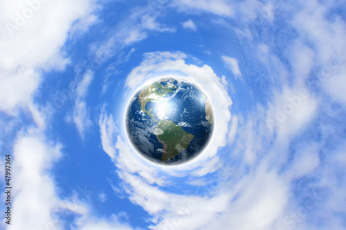Photo: Planet earth against sky background Planet earth against sky background