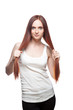 beautiful red haired girl holding her hair