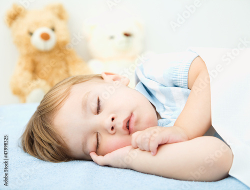 Photo: Cute little boy is sleeping Cute little boy is sleeping