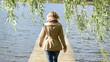woman walk wood lake bridge willow tree swan bird meet angry