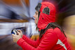 Photo: Game playing. Young and crazy girl playing video games Game playing. Young and crazy girl playing video games