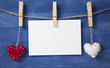 Photo: two fabric hearts on wooden background two fabric hearts on wooden background