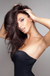 fashion style portrait of delicate brunette woman 