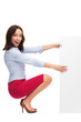 Businesswoman with blank sign