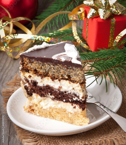 Photo: Christmas cakes on wooden background Christmas cakes on wooden background
