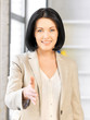 woman with an open hand ready for handshake