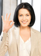 young woman showing ok sign