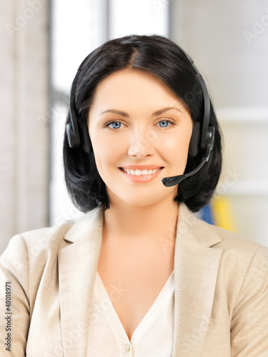 Photo: friendly female helpline operator friendly female helpline operator