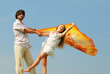 Photo: Beautiful man and the woman on a summer field Beautiful man and the woman on a summer field