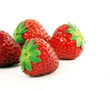 Varias fresas en fondo blanco.