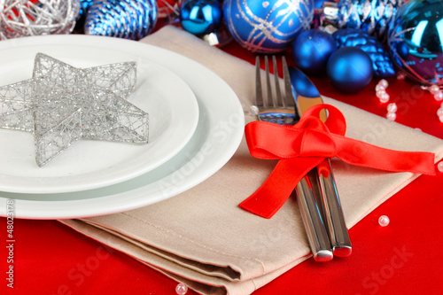 Photo: Serving Christmas table close-up Serving Christmas table close-up