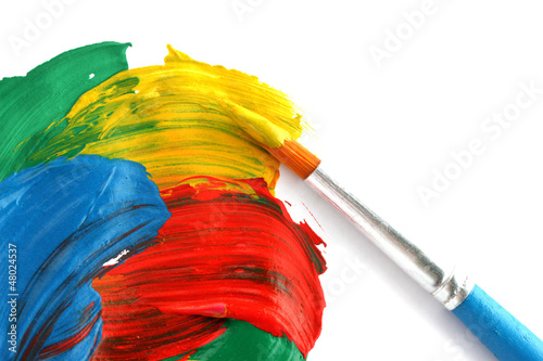 Photo: Abstract gouache paint and brush, isolated on white Abstract gouache paint and brush, isolated on white