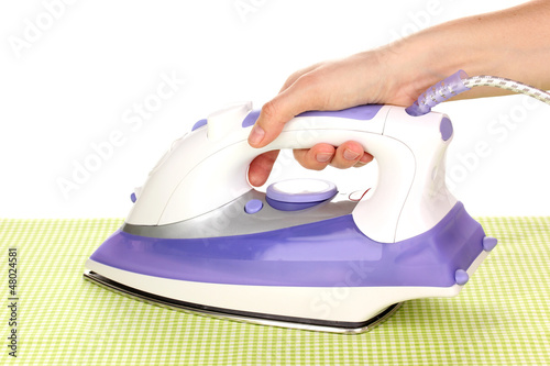 Photo: ironing green cloth isolated on white ironing green cloth isolated on white