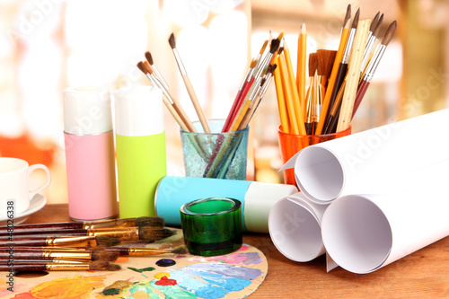 Photo: Artistic equipment: paint, brushes and art palette Artistic equipment: paint, brushes and art palette