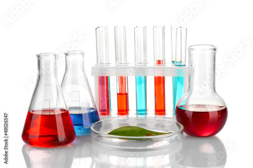 Photo: Test-tubes and green leaf tested in petri dish, isolated Test-tubes and green leaf tested in petri dish, isolated