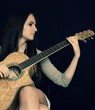 Young girl with guitar.