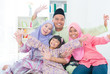 Excited Southeast Asian family