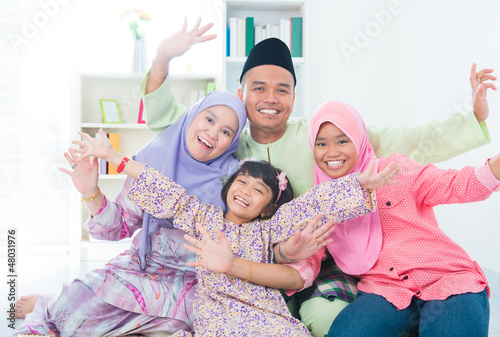 Photo: Excited Southeast Asian family Excited Southeast Asian family