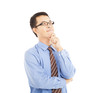 young businessman thinking and isolated on white