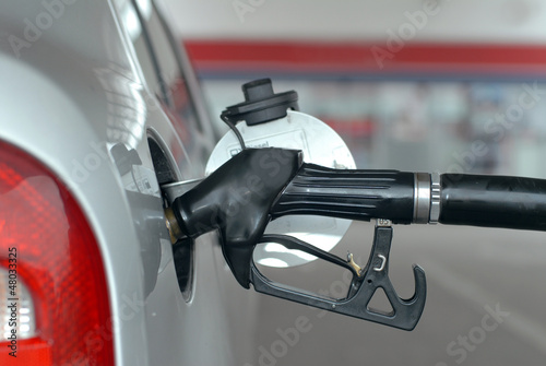 Photo: Car fueling at the gas station Car fueling at the gas station