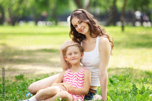 Photo: Mother and daughter in the park Mother and daughter in the park