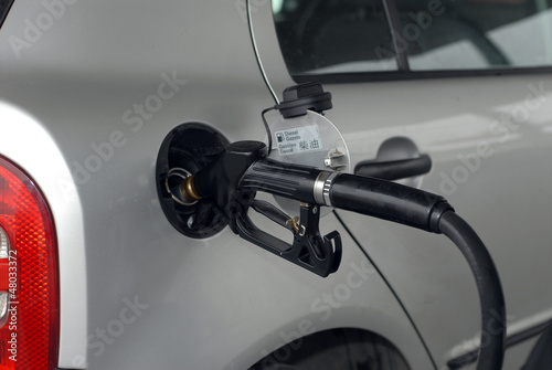 Photo: Car fueling at the gas station Car fueling at the gas station